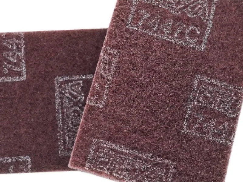 不織布精練ロールおよびパッド